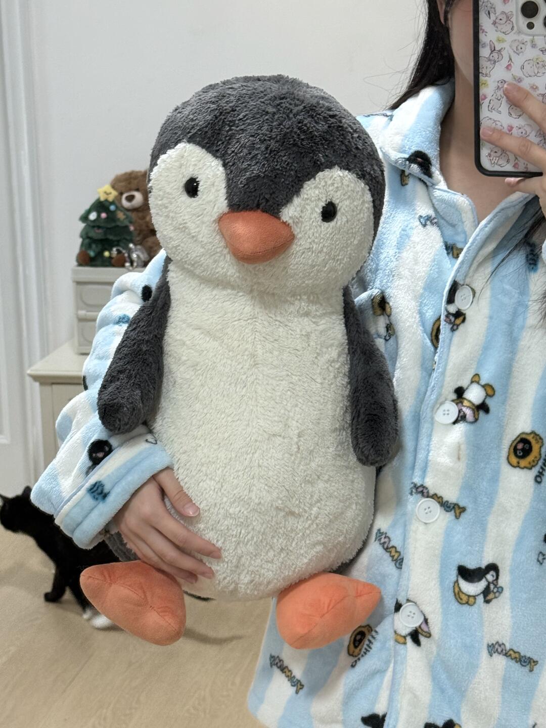 Peanut Penguin plush sewing tutorial showing the penguin body being stitched before turning
