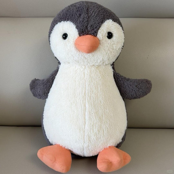 Peanut Penguin plush sewing tutorial showing fabric pattern pieces and sewing construction steps