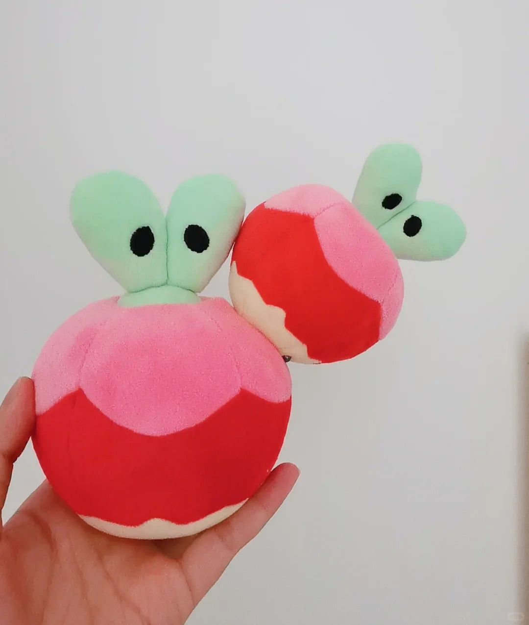 1. Applin Pokemon plush sewing pattern – completed green Applin caterpillar plush side view