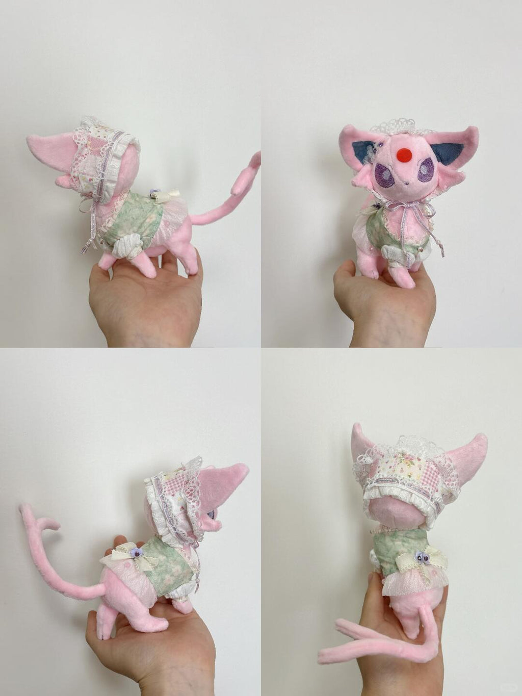 A four-panel photo showing a small pink plush Pokémon eevee cat figurine from multiple angles, held in a person's hand against a plain light background. The plush has large pink ears, a long tail, and a pale green and white lace dress.