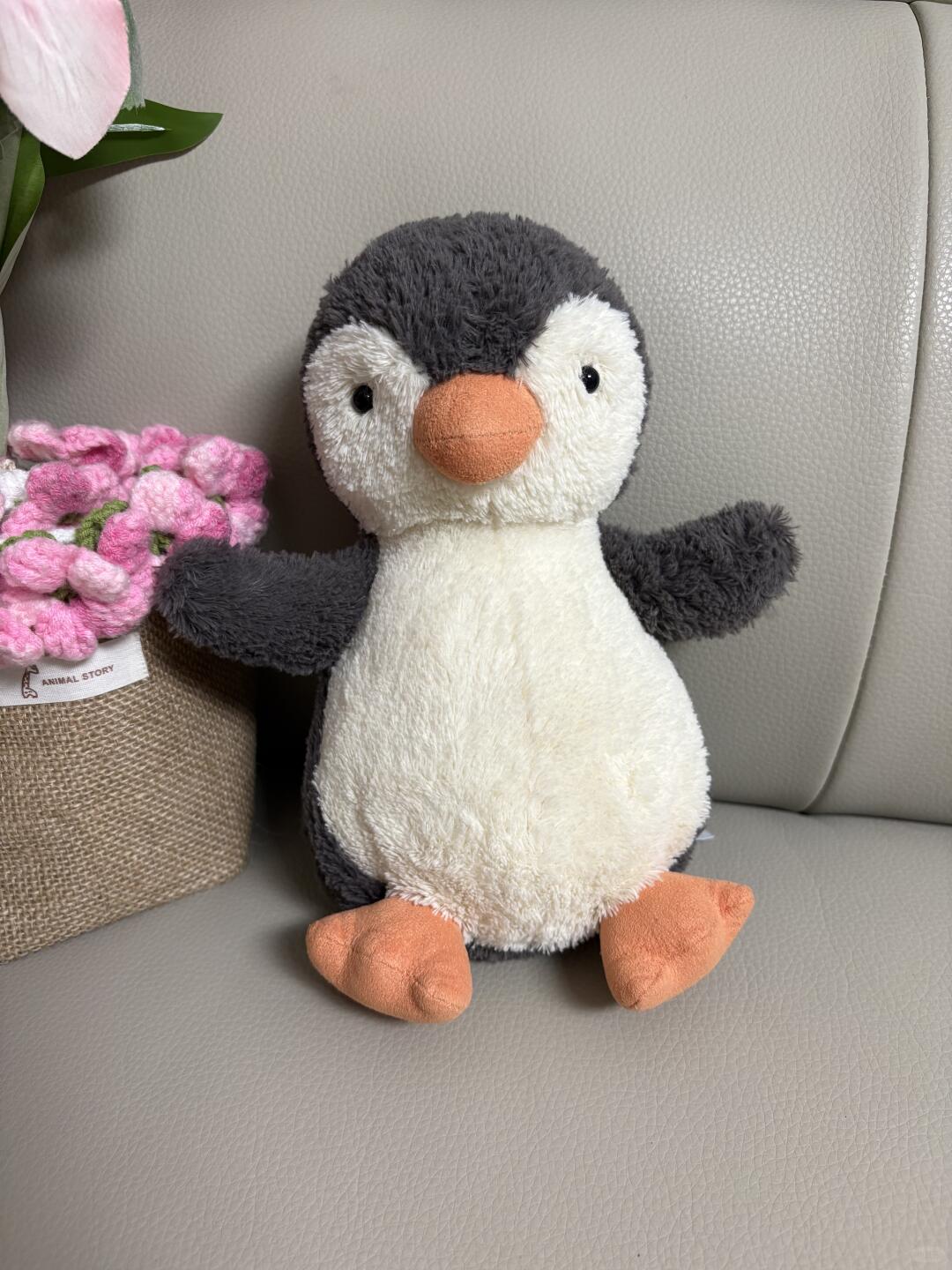 Peanut Penguin plush sewing process showing the sewn penguin shape before stuffing