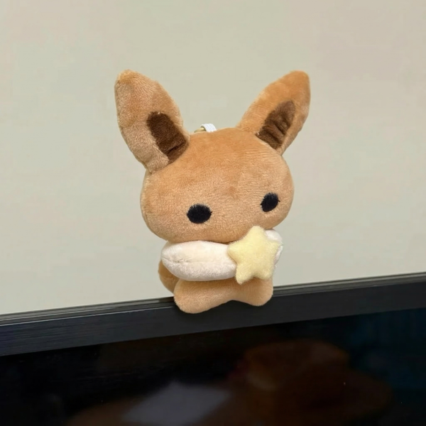 Cute Handmade Eevee Plush toy resembling a fox holding a star, Pokemon plush toy. 