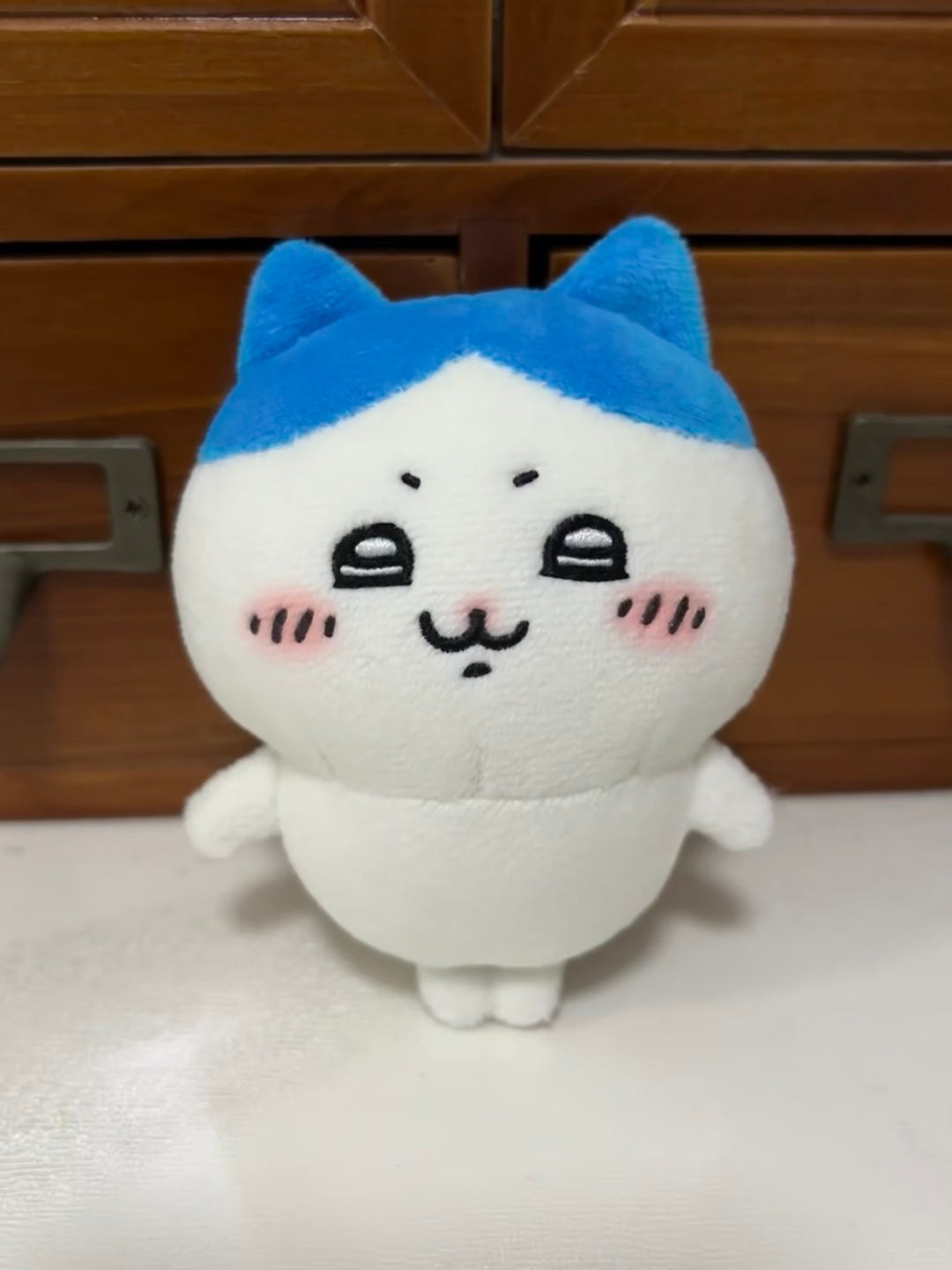 Handmade Hachiware plush with blue ears and embroidered face