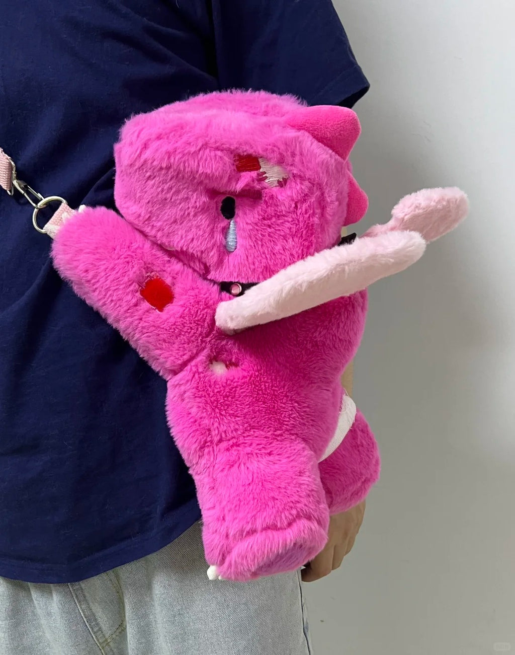 Pink Boltusk lightning elemental dragon plush with white tusks and stitched lightning details