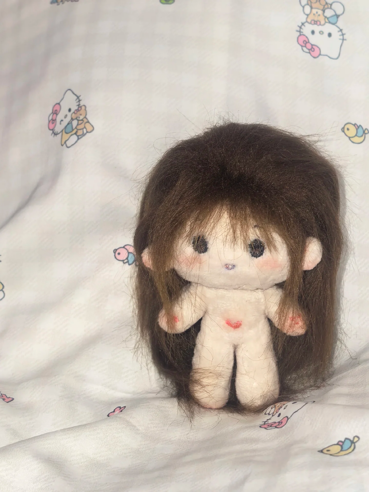 Finished long-haired plush doll styling example