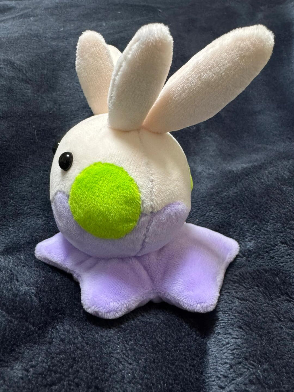 Handmade Goomy plush side view showing green cheek detail
