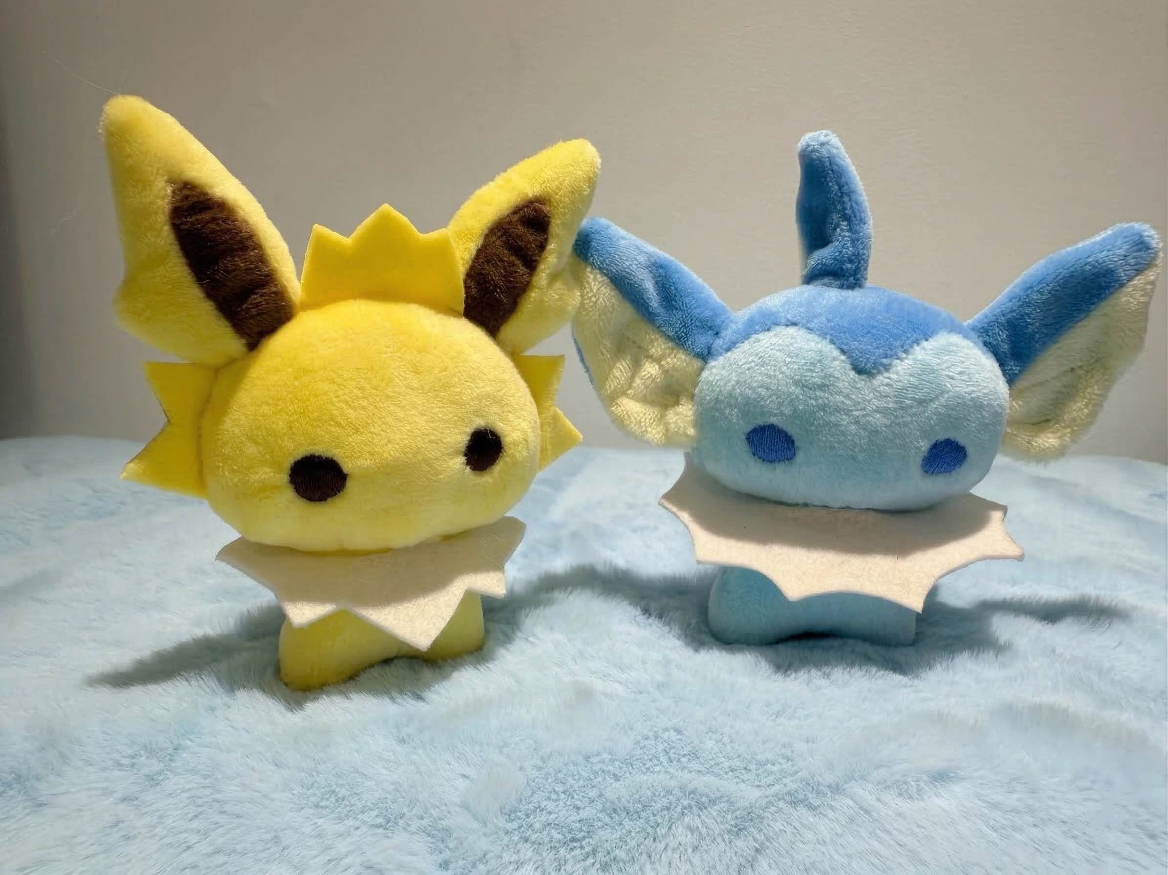 Jolteon and Vaporeon plush sewing pattern PDF featuring handmade Eeveelution plush toys
