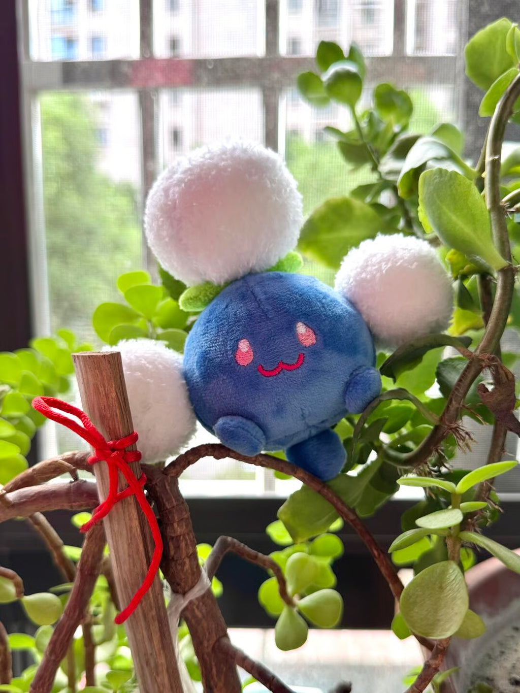 Jumpluff plush sewing pattern PDF shown with a handmade pastel cotton-puff Pokémon-inspired plush