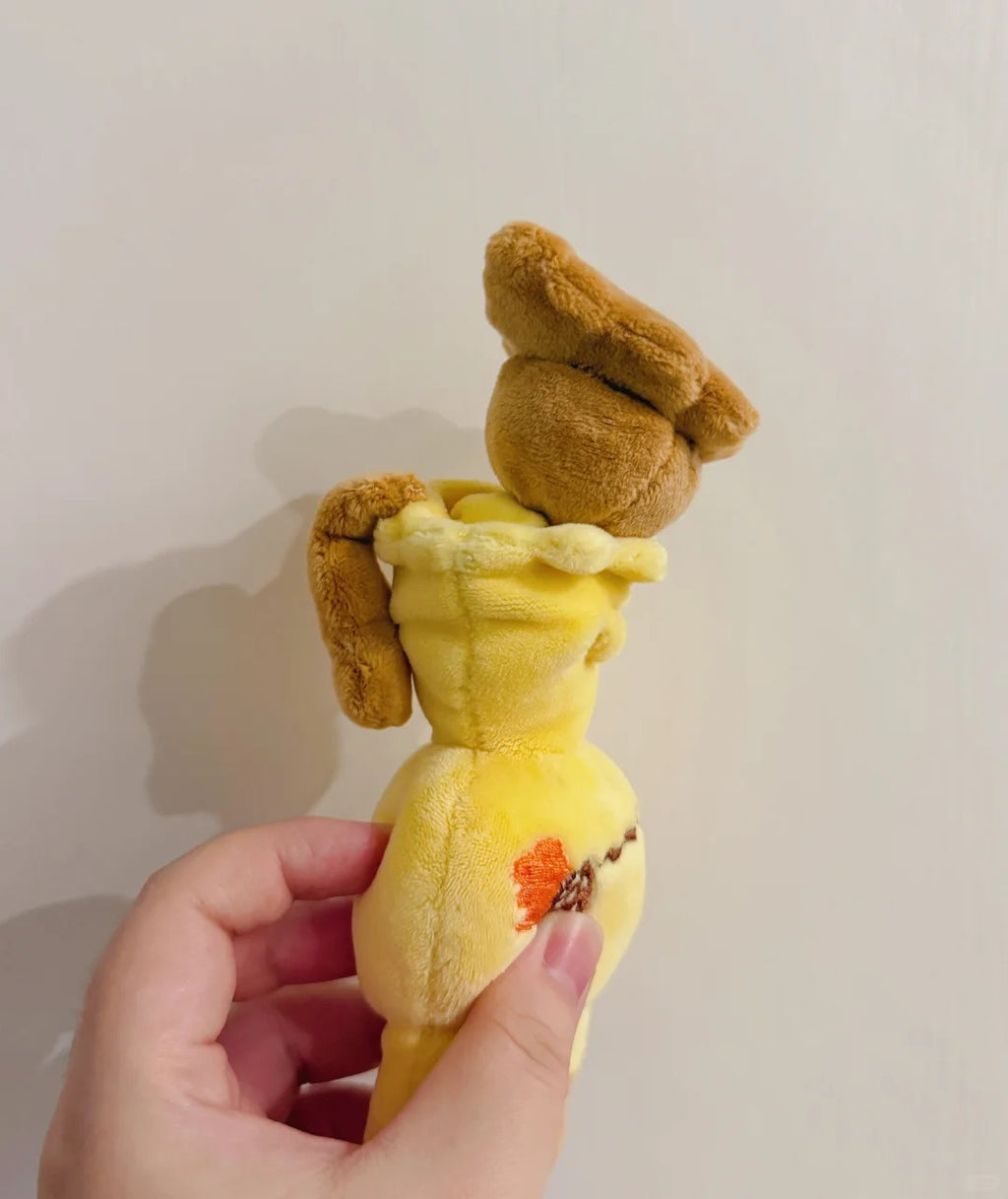 Mimikyu plush sewing sample with the outer disguise lifted to show the inner doll