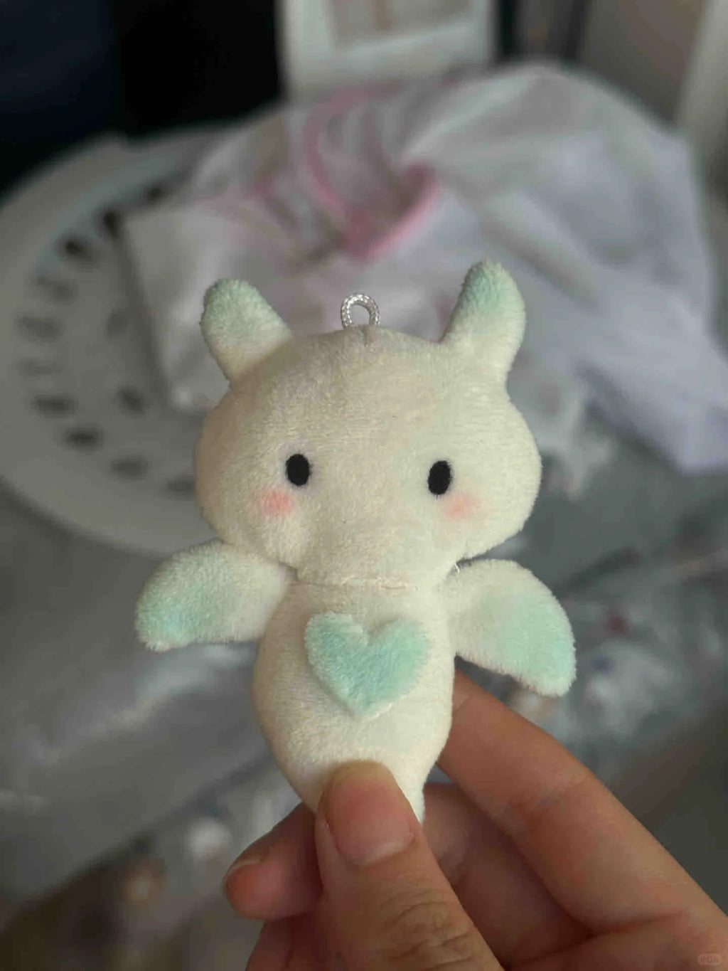 Mini white angel bat plush charm with soft wings and hanging loop