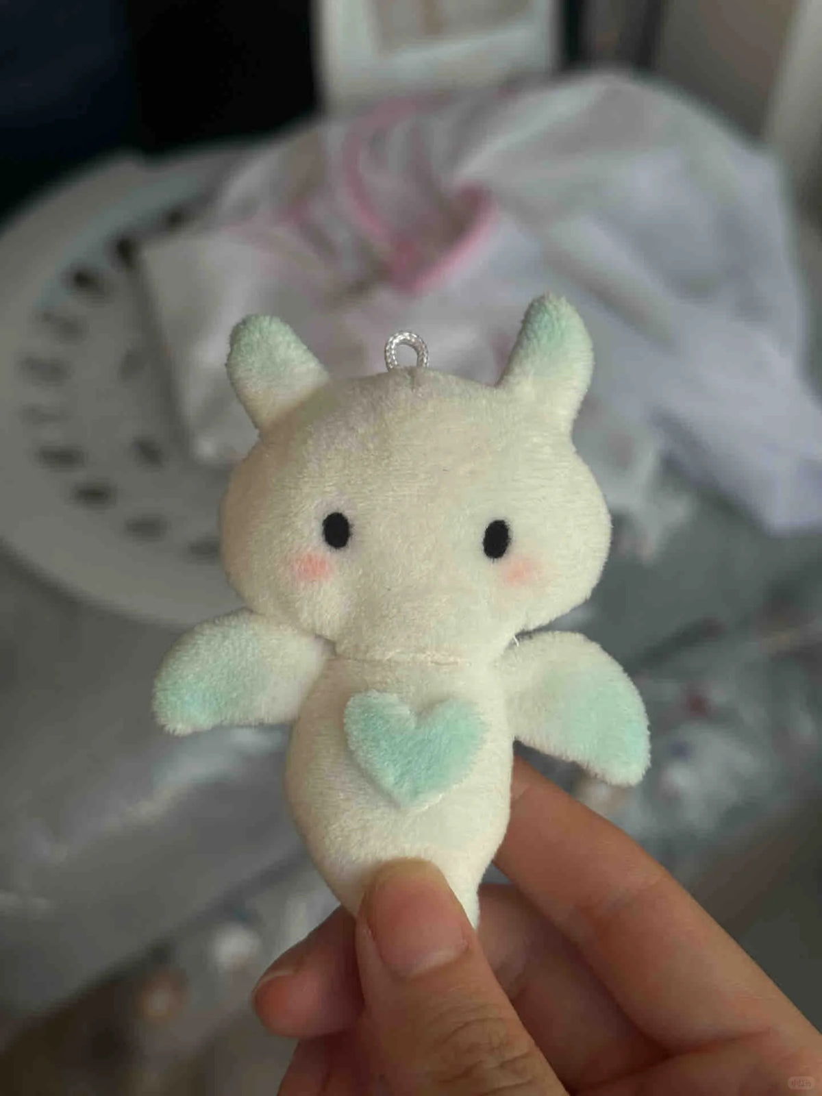 Mini white angel bat plush charm with soft wings and hanging loop