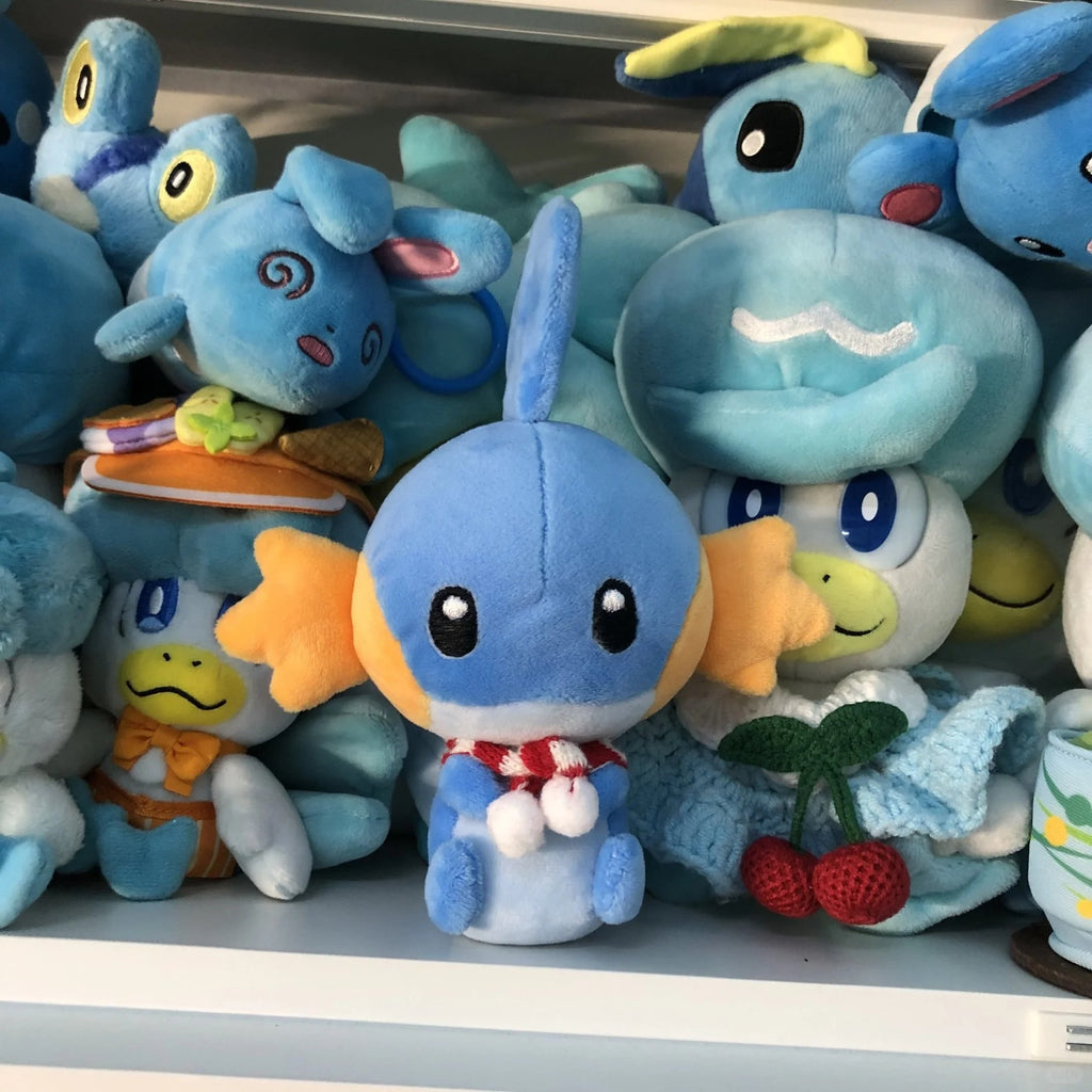 Handmade Mudkip plushie display – Pokémon crafts plush sewing inspiration