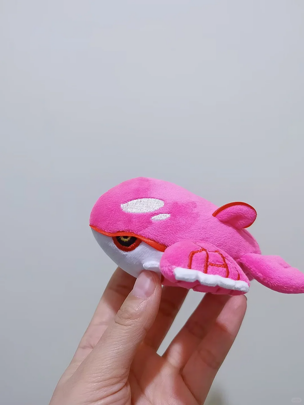 Handmade pink shiny Kyogre plush made from the printable sewing pattern