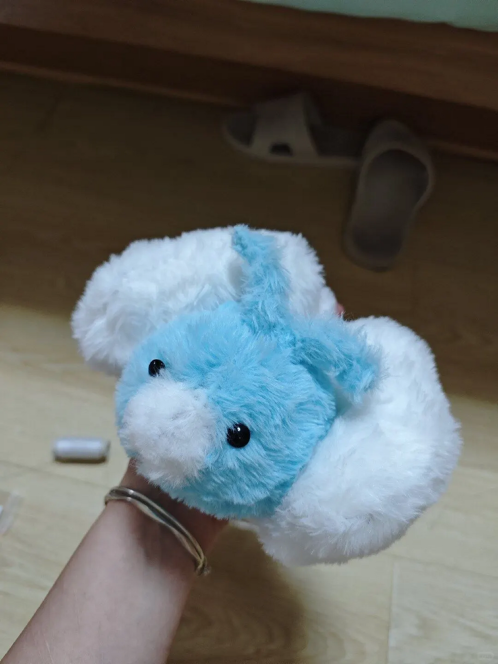 Hand-held blue Swablu plush with soft white cloud wings
