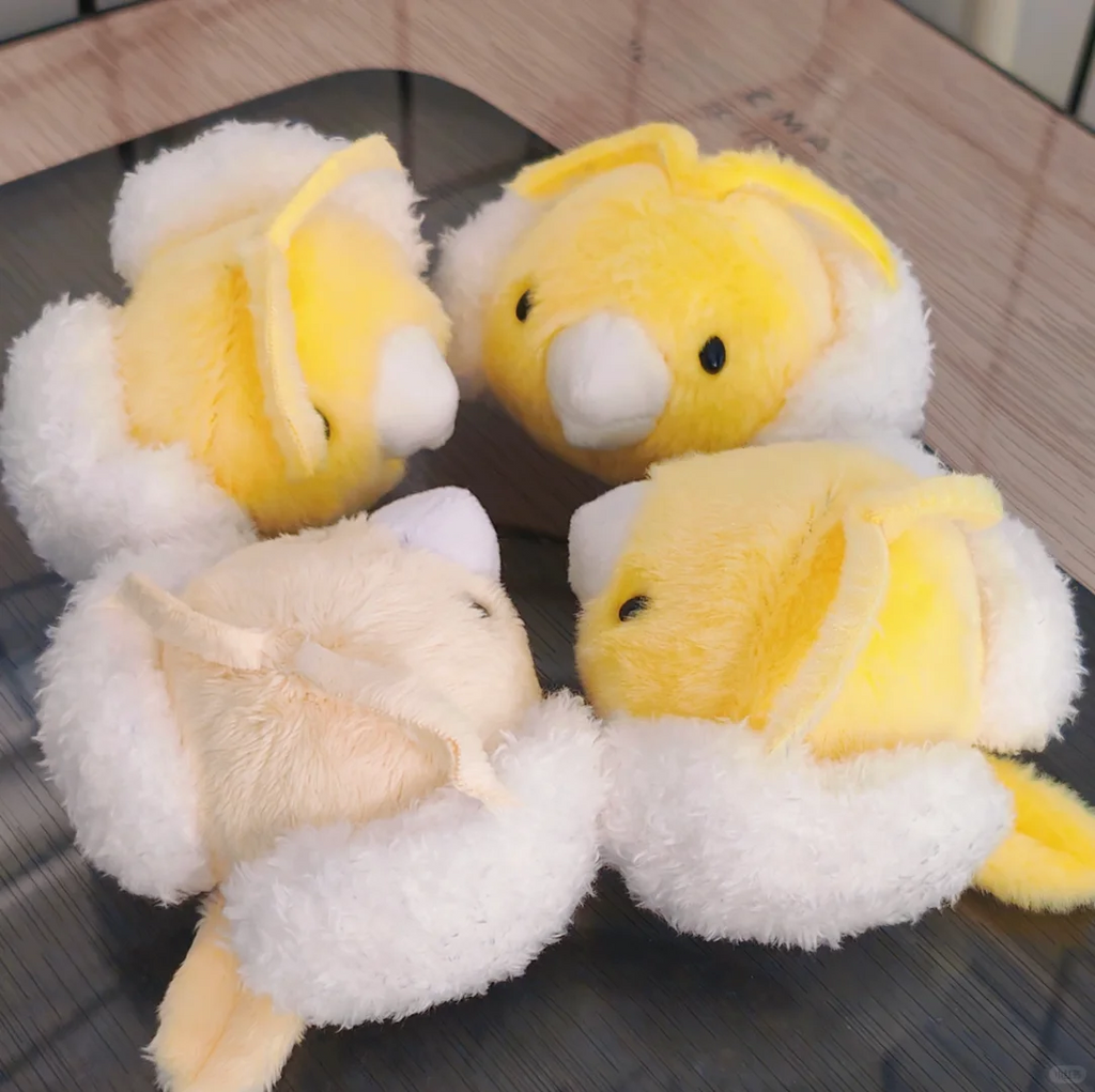 Yellow and cream Swablu plush colour variations with fluffy white cloud wings