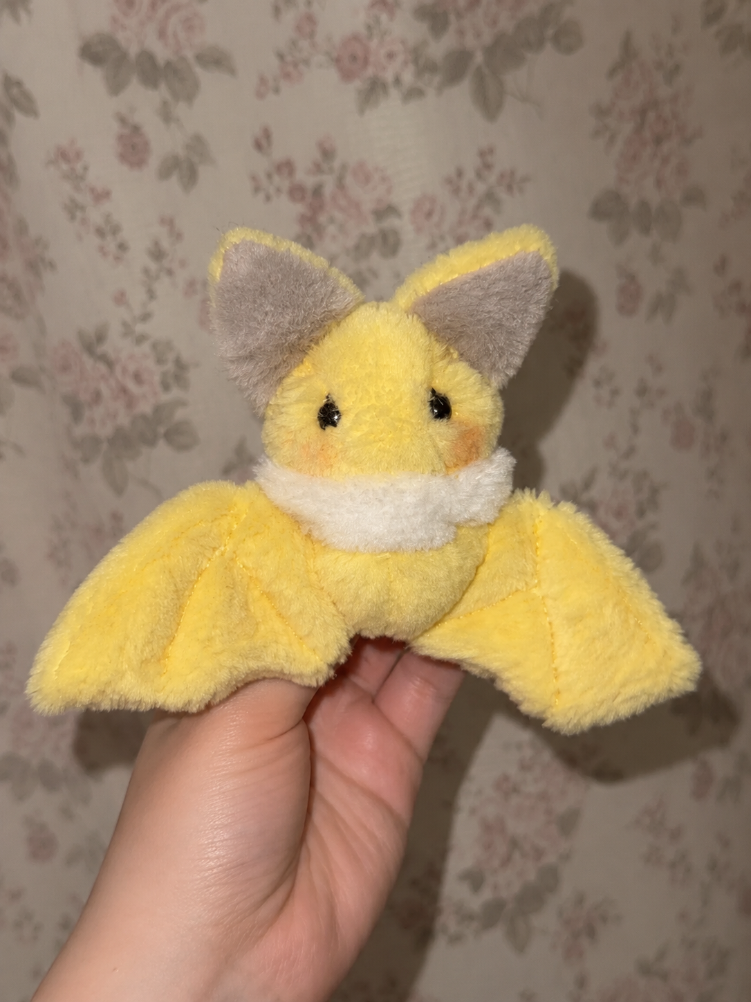 Handmade yellow bat plush sewing pattern finished example, handheld
